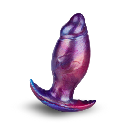 Purple and blue silicone butt plug on a white background